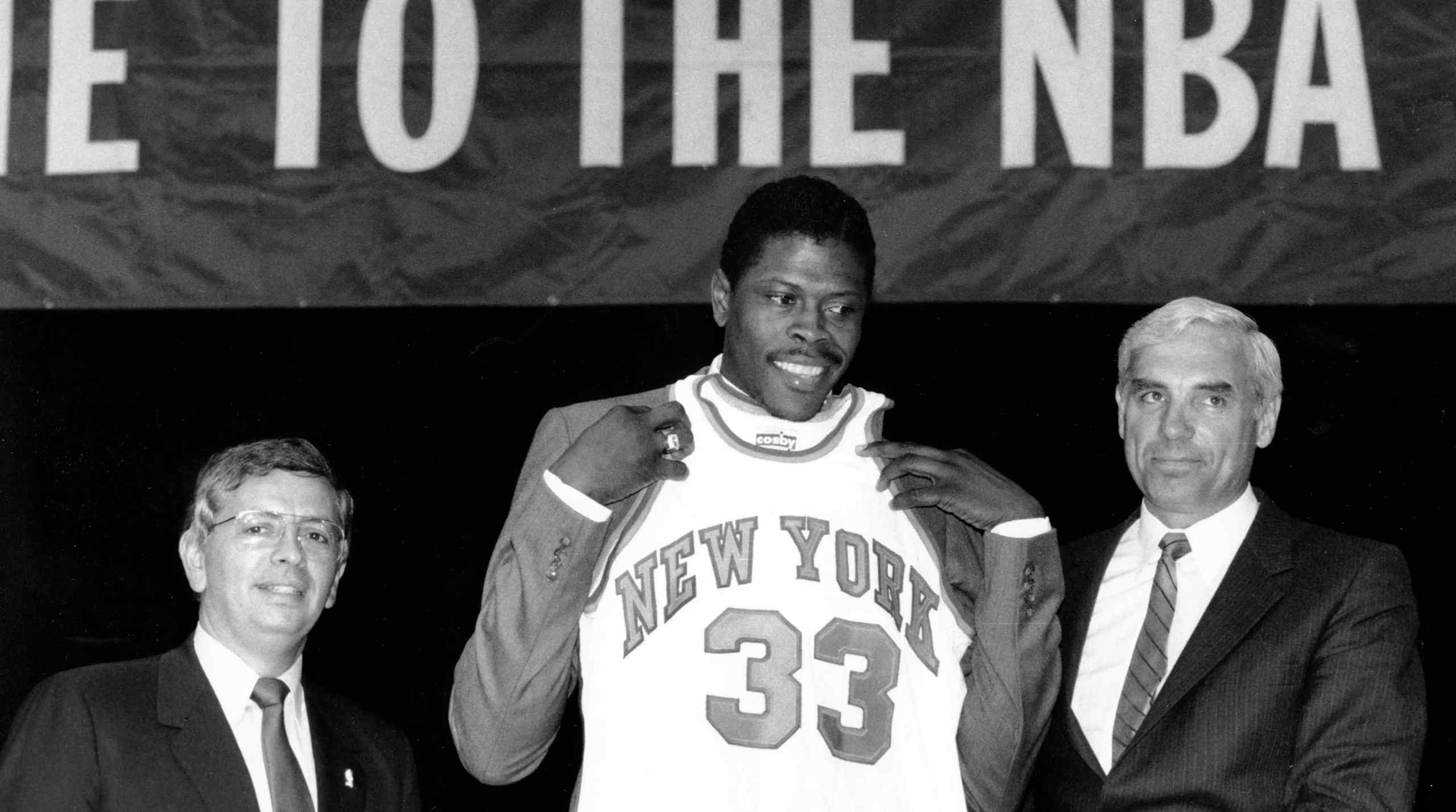 A photo of Patrick Ewing getting drafted by the New York Knicks.